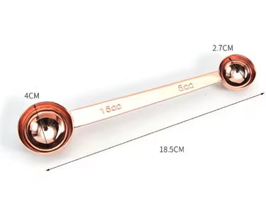 Professional double-sided stainless steel coffee scoop with 5mL and 15mL ends for accurate dosing.